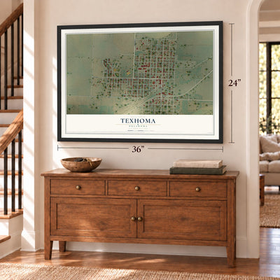 Texhoma, Oklahoma map, 24 x 36 inch print in a black frame above a dresser by a staircase