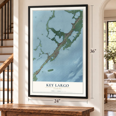 Key Largo, Florida map, 24 x 36 inch print in a black frame by a staircase