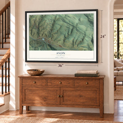 Avon, Colorado map, 24 x 36 inch print in a black frame above a dresser by a staircase