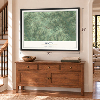 Wiota, Wisconsin map, 24 x 36 inch print in a black frame above a dresser by a staircase