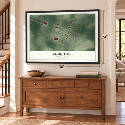 Clarkton, North Carolina map, 24 x 36 inch print in a black frame above a dresser by a staircase