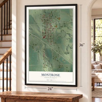 Montrose, South Dakota map, 24 x 36 inch print in a black frame by a staircase