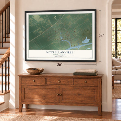 McClellanville, South Carolina map, 24 x 36 inch print in a black frame above a dresser by a staircase