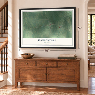 Stantonville, Tennessee map, 24 x 36 inch print in a black frame above a dresser by a staircase