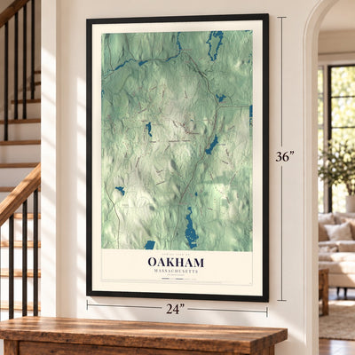 Oakham, Massachusetts map, 24 x 36 inch print in a black frame by a staircase