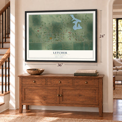 Letcher, South Dakota map, 24 x 36 inch print in a black frame above a dresser by a staircase