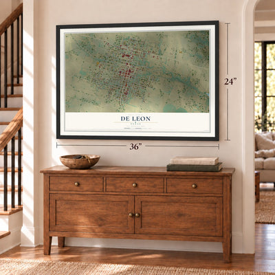 De Leon, Texas map, 24 x 36 inch print in a black frame above a dresser by a staircase
