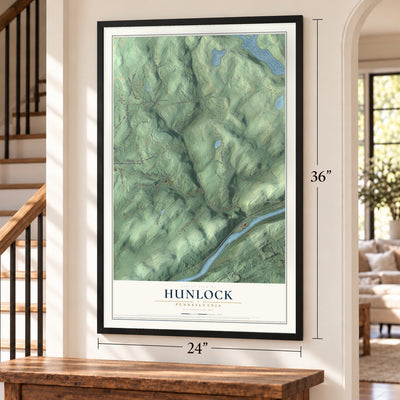 Hunlock, Pennsylvania map, 24 x 36 inch print in a black frame by a staircase