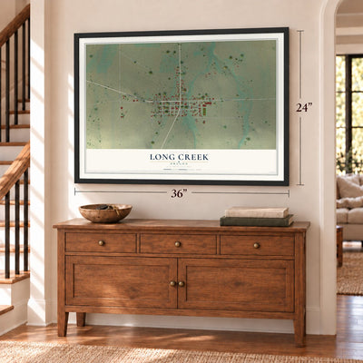 Long Creek, Oregon map, 24 x 36 inch print in a black frame above a dresser by a staircase