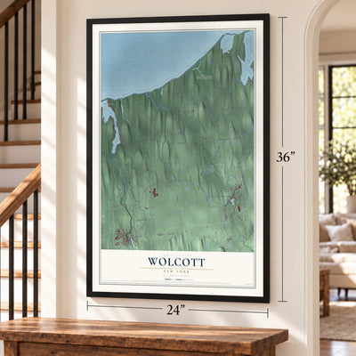 Wolcott, New York map, 24 x 36 inch print in a black frame by a staircase