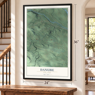 Danube, New York map, 24 x 36 inch print in a black frame by a staircase