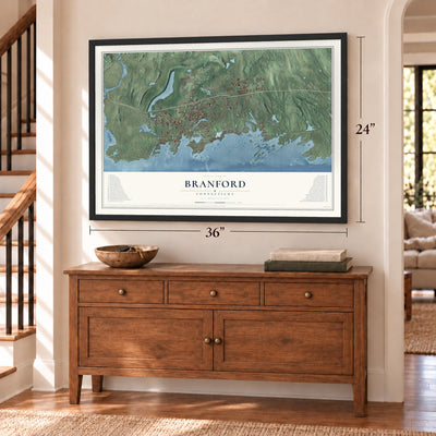 Branford, Connecticut map, 24 x 36 inch print in a black frame above a dresser by a staircase