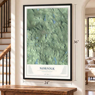 Norfolk, Connecticut map, 24 x 36 inch print in a black frame by a staircase