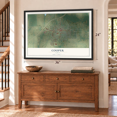 Cooper, Texas map, 24 x 36 inch print in a black frame above a dresser by a staircase
