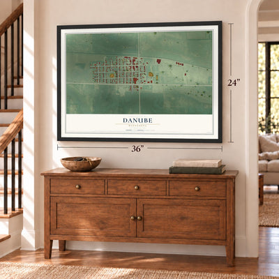 Danube, Minnesota map, 24 x 36 inch print in a black frame above a dresser by a staircase