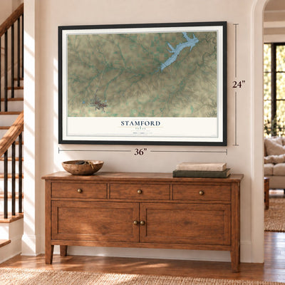 Stamford, Texas map, 24 x 36 inch print in a black frame above a dresser by a staircase