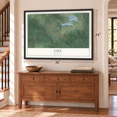 Cale, Arkansas map, 24 x 36 inch print in a black frame above a dresser by a staircase