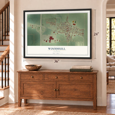 Woodhull, Illinois map, 24 x 36 inch print in a black frame above a dresser by a staircase
