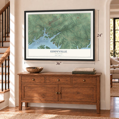 Eddyville, Kentucky map, 24 x 36 inch print in a black frame above a dresser by a staircase