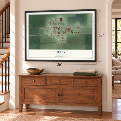 Shelby, Nebraska map, 24 x 36 inch print in a black frame above a dresser by a staircase