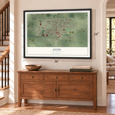 Avon, South Dakota map, 24 x 36 inch print in a black frame above a dresser by a staircase