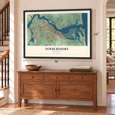 Newburyport, Massachusetts map, 24 x 36 inch print in a black frame above a dresser by a staircase