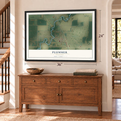 Plummer, Minnesota map, 24 x 36 inch print in a black frame above a dresser by a staircase