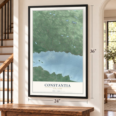 Constantia, New York map, 24 x 36 inch print in a black frame by a staircase