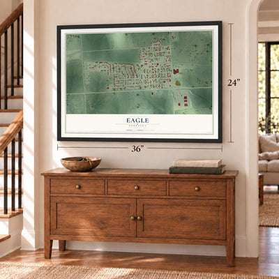 Eagle, Nebraska map, 24 x 36 inch print in a black frame above a dresser by a staircase