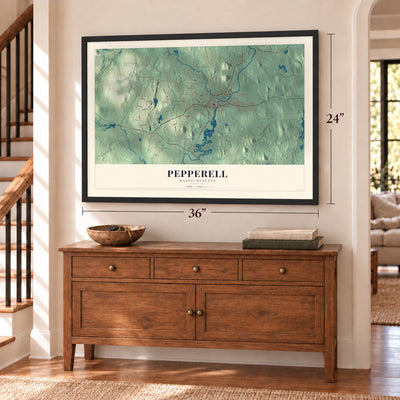 Pepperell, Massachusetts map, 24 x 36 inch print in a black frame above a dresser by a staircase