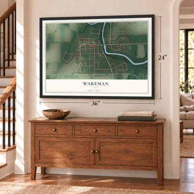 Wakeman, Ohio map, 24 x 36 inch print in a black frame above a dresser by a staircase