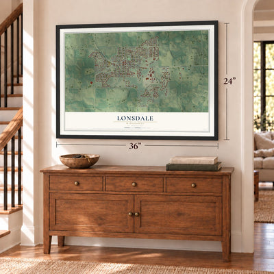 Lonsdale, Minnesota map, 24 x 36 inch print in a black frame above a dresser by a staircase