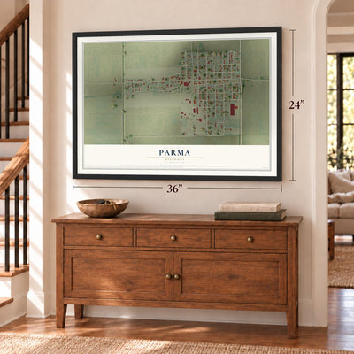 Parma, Missouri map, 24 x 36 inch print in a black frame above a dresser by a staircase