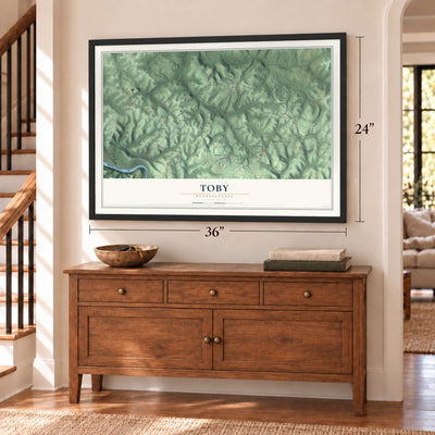 Toby, Pennsylvania map, 24 x 36 inch print in a black frame above a dresser by a staircase