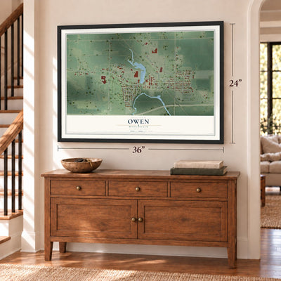 Owen, Wisconsin map, 24 x 36 inch print in a black frame above a dresser by a staircase