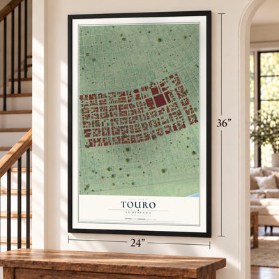Touro, Louisiana map, 24 x 36 inch print in a black frame by a staircase