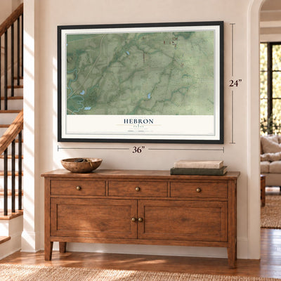 Hebron, Texas map, 24 x 36 inch print in a black frame above a dresser by a staircase