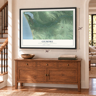 Gilmore, Benzie County, Michigan map, 24 x 36 inch print in a black frame above a dresser by a staircase