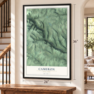 Cameron, New York map, 24 x 36 inch print in a black frame by a staircase