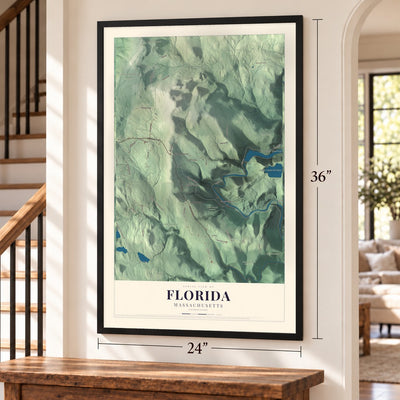 Florida, Massachusetts map, 24 x 36 inch print in a black frame by a staircase