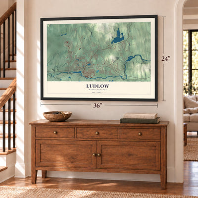 Ludlow, Massachusetts map, 24 x 36 inch print in a black frame above a dresser by a staircase