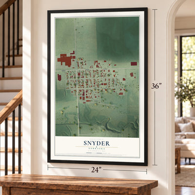 Snyder, Nebraska map, 24 x 36 inch print in a black frame by a staircase