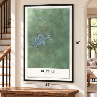 Butman, Michigan map, 24 x 36 inch print in a black frame by a staircase