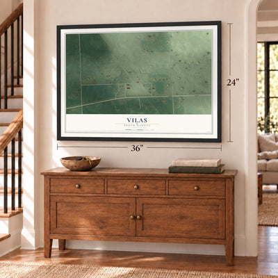 Vilas, South Dakota map, 24 x 36 inch print in a black frame above a dresser by a staircase