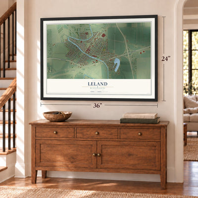 Leland, Mississippi map, 24 x 36 inch print in a black frame above a dresser by a staircase