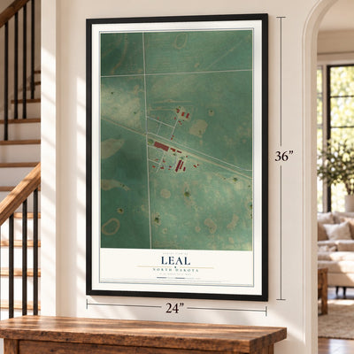 Leal, North Dakota map, 24 x 36 inch print in a black frame by a staircase