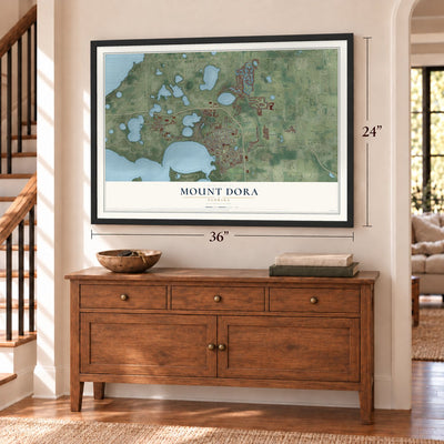 Mount Dora, Florida map, 24 x 36 inch print in a black frame above a dresser by a staircase