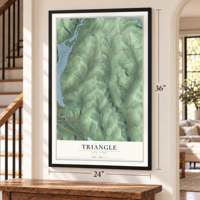 Triangle, New York map, 24 x 36 inch print in a black frame by a staircase