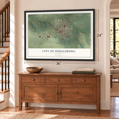 Shullsburg, Wisconsin map, 24 x 36 inch print in a black frame above a dresser by a staircase