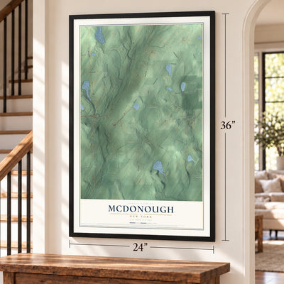 McDonough, New York map, 24 x 36 inch print in a black frame by a staircase